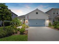 Charming single-story home with a well-manicured lawn and a welcoming two-car garage in a desirable neighborhood at 10120 Canaveral Cir, Sarasota, FL 34241