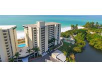 Beautiful beachfront condo with lush landscaping and a gorgeous turquoise ocean view at 19 Whispering Sands Dr # 805, Sarasota, FL 34242