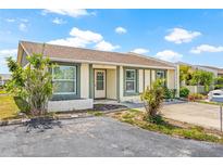 Charming single-story home with well-maintained landscaping and a cozy front entrance, under a blue sky at 3901 41St W St, Bradenton, FL 34205