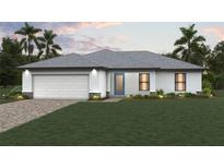 Charming single-story home featuring a two-car garage, a blue front door, and a well-manicured front lawn at 10547 Kidron Ave, Englewood, FL 34224