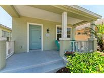 Inviting front porch with space for seating and charming curb appeal at 5420 River Sound Ter, Bradenton, FL 34208