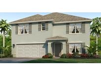 Charming two-story home featuring a two-car garage and decorative shutters at 10825 Gentle Current Way, Parrish, FL 34219