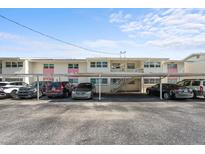 Exterior shot of condo building featuring covered parking at 2503 Beneva Rd # 7, Sarasota, FL 34232