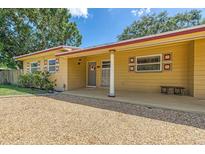 Charming single-story home with covered entry and colorful window trim at 2702 45Th S St, Gulfport, FL 33711