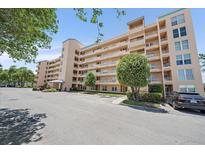 Beautiful condominium building boasting multiple floors and balcony views from each unit at 4570 Pinebrook Cir # 508, Bradenton, FL 34209