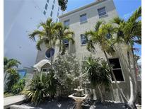Beautiful building exterior featuring lush landscaping and a charming fountain near the entryway at 1345 2Nd St, Sarasota, FL 34236