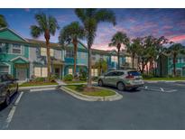 Charming townhomes with vibrant exteriors, lush landscaping, and convenient parking at 4727 Sabal Key Dr # 4727, Bradenton, FL 34203