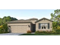 Charming single-story home featuring stone accents, a two-car garage and well-maintained landscaping at 17805 Pastureland Ave, Lakewood Ranch, FL 34211