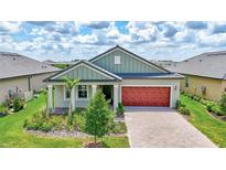 Charming single-Gathering home with a brick driveway and beautifully landscaped front yard in a Gathering-friendly neighborhood at 12743 Tahitian Pearl Cir, Parrish, FL 34219