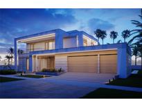 Contemporary home featuring a sleek design, complemented by a two-car garage and manicured landscaping at 2470 Ringling Blvd, Sarasota, FL 34237