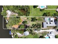 Large lot with mature trees and a charming home featuring a private pool at 4771 Riverwood Cir, Sarasota, FL 34231
