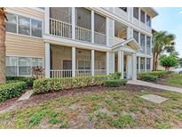 Inviting condo building with screened porches and lush landscaping offering a relaxed and comfortable living environment at 4802 51St W St # 808, Bradenton, FL 34210