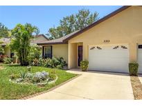 Charming single Gathering home featuring a well-maintained lawn and attached one car garage at 3311 39Th W Pl, Bradenton, FL 34205