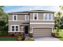 Beautiful two-story home featuring stone accents, neutral colors, and an attached two-car garage at 17904 Tavernside Trl, Bradenton, FL 34211