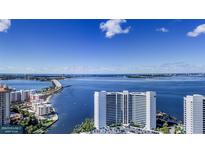 Stunning view of the high-rise condo overlooking the ocean and city skyline at 555 Quay Cmn # 1801, Sarasota, FL 34236