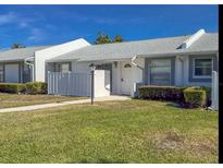 Charming single-story home featuring a well-maintained lawn and cozy front porch at 3703 39Th Street W # 11, Bradenton, FL 34205