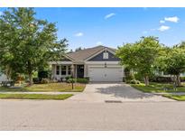 Charming single-Gathering home featuring a two-car garage, landscaped yard, and a well-maintained lawn at 11434 Spring Gate Trl, Bradenton, FL 34211