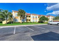 A view of the exterior of a multi-Gathering building with parking available at 3005 Chianti Ct # 103, Sarasota, FL 34237