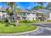 Charming condo exterior featuring well-maintained landscaping and a welcoming entrance at 7866 Eagle Creek Dr # 7866, Sarasota, FL 34243