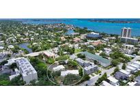 Stunning aerial view of waterfront property showcasing lush surroundings and scenic coastal views at 1740 Alderman St # 7, Sarasota, FL 34236