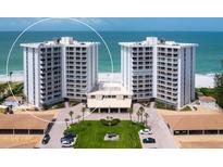 Beautiful beachfront condo complex featuring stunning ocean views and well-maintained grounds at 2295 Gulf Of Mexico Dr # 64S, Longboat Key, FL 34228