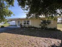 Well-maintained home featuring a covered carport, offering a blend of comfort and convenience at 1224 38Th W St, Bradenton, FL 34205