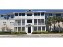 Beautiful condo complex featuring multiple screened lanais and well-maintained landscaping at 4802 51St W St # 1313, Bradenton, FL 34210