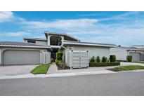 Attractive condo with a two-car garage and lovely landscaping at 2155 Harbourside Dr # 804, Longboat Key, FL 34228