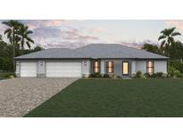 Charming single-story home featuring a three-car garage, well-maintained lawn and lush landscaping at 16338 Juarez Cir, Punta Gorda, FL 33955