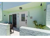 Entrance view showcasing a private outdoor space featuring a secure entrance at 1753 Dawn St # 305, Sarasota, FL 34231