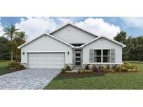 Charming single-story home with a two-car garage, stone accents, and beautifully landscaped front yard at 1770 Cobb Trl, Parrish, FL 34219