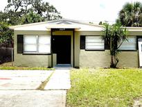 Charming single-story home featuring a well-maintained lawn and inviting entrance at 2629 14Th S Ave, St Petersburg, FL 33712