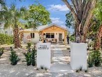Charming single-story home with a landscaped yard, walkway, and inviting curb appeal at 2189 Hillview St, Sarasota, FL 34239