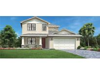 Charming two-story home with a well-manicured lawn, a two-car garage, and a welcoming front porch at 12936 Morning Mist Pl, Venice, FL 34293