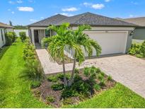 Charming single-story home featuring a well-maintained front yard and a two-car garage at 6612 Silverstar Dr, Sarasota, FL 34240