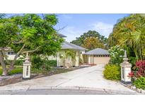 Charming single-story home with a two-car garage and a well-manicured yard at 7615 4Th Avenue Nw Dr, Bradenton, FL 34209