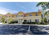 Inviting exterior showcasing the well-maintained facade, landscaping, and ample parking spaces at 13084 Tigers Eye Dr, Venice, FL 34292