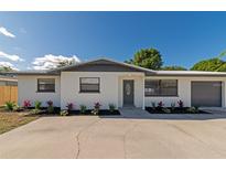 Charming single-story home featuring a well-maintained front yard and a freshly painted exterior at 4505 18Th W Ave, Bradenton, FL 34209