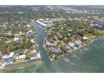 Stunning aerial view of waterfront homes and the condo community at 1709 N Tamiami Trail # Ph 514, Sarasota, FL 34234