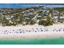 Charming beachside home near the Gulf Coast offering stunning views and easy access to sandy beaches at 3720 Gulf Dr, Holmes Beach, FL 34217