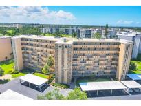 Multi-story condo with manicured landscaping and covered parking at 3640 Ironwood Cir # 302N, Bradenton, FL 34209
