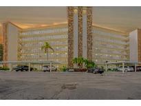 Spacious condo building with parking, landscaped grounds, and balconies at 3680 Ironwood Cir # 603L, Bradenton, FL 34209