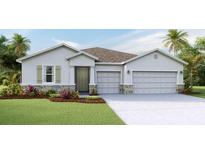 Charming single-story home with a well-manicured lawn and two-car garage at 10721 Tippecanoe Pl, Parrish, FL 34219