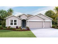 Inviting single-story home with a three-car garage, manicured lawn, and a welcoming front entrance at 16019 10Th E Ave, Bradenton, FL 34212