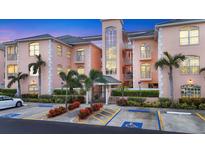 Attractive condo building featuring well maintained landscaping and accessible parking at 1613 Gondola Park Dr # 1613, Venice, FL 34292