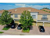 Charming townhomes featuring private garages, manicured landscaping, and inviting curb appeal in a desirable neighborhood at 4026 Overture Cir # 487, Bradenton, FL 34209