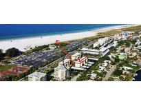 Gorgeous aerial view of complex near Siesta Key Beach and its white sand at 915 Beach Rd # 321, Sarasota, FL 34242