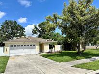 Charming single-story home with a well-maintained front yard and a two-car garage at 3918 Wake Ave, Sarasota, FL 34241