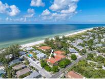 Beautiful aerial view of La Casa Costiera condos complex with stunning ocean view and access to the beach at 7324 Gulf Dr # 12, Holmes Beach, FL 34217