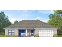 Charming one-story home with a gray roof and attached garage at 4535 Luther Ave, North Port, FL 34288